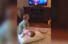 These twins seem to be watching TV but the video that their Mom makes is much more fun!