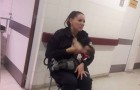 An Argentinean policewoman nurses the child of a woman who had been arrested and for her kind gesture she was promoted