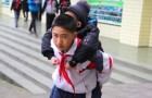 Every day for 6 years, this boy has carried his best friend on his back to allow him to attend school