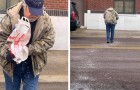 Un père attentionné sème le sel sur la route glacée pour éviter que sa fille ne glisse sur le chemin du travail