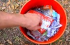 This man puts his junk MAIL in a bucket of water: the result is surprising.