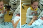 Little girl is overwhelmed when she sees her newborn sister for the first time (+ VIDEO)