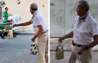 Oudere man geeft kerstcadeaus aan de vuilnismannen in zijn buurt om hen te bedanken voor hun dagelijkse werk