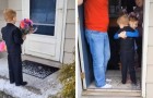 Young boy gives a Valentine to his classmate by turning up in a suit and with flowers at her door