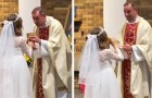 Siebenjähriges Mädchen trinkt bei seiner ersten Kommunion zu viel aus dem Kelch und der Priester versucht, es aufzuhalten (+ VIDEO)