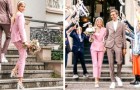 Bride rejects the classic, white wedding dress and chooses a pink jacket and trousers