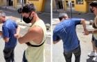 Father-in-law walks out hand in hand with his son-in-law to help him overcome the fear of doing so with his boyfriend in public
