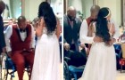 Costretto su sedia a rotelle, sposo si sforza per ballare con la moglie: 