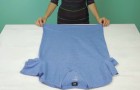 Here's how to fold a T-shirt while saving space and avoiding creases. BRILLIANT!