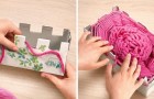 Come creare una sciarpa utilizzando la lana e due scatole di cartone