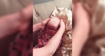 A baby can see her mother's face for the first time!