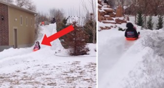 A father builds his kids a thrilling snow slide track! WoW!