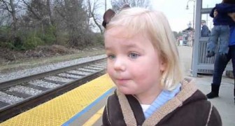 The amazement of a young girl when the train arrives
