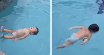 Een kind van 1 jaar stapt het zwembad in en laat ons zien hoe het hebben leren zwemmen je leven kan redden
