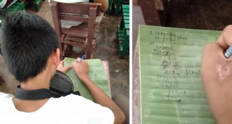Cet élève n'avait pas d'argent pour un cahier, alors il a utilisé des feuilles de bananier pour écrire ses notes