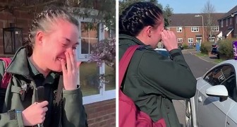A nurse bursts into tears when her neighbors step outside their houses and applaud to thank her for the work she's doing during the Coronavirus outbreak.