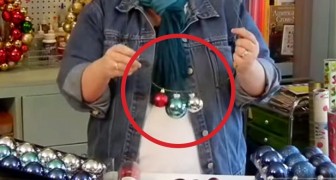 Using a coat hanger and some balls, this woman creates a Christmas decoration that will amaze you!!
