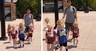 Pai criticado por levar os 5 filhos na coleira: é para a segurança deles