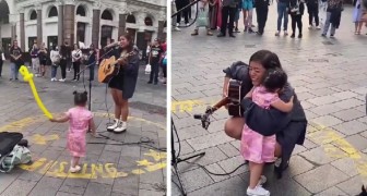 Meisje is gefascineerd door de muziek van een straatartiest en wil niet naar huis: ze omhelst haar