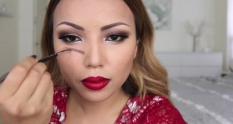 She start by drawing an EYE on her cheekbones ... the end result is impressive !