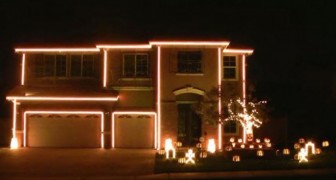 It may seem like a normal light show for the holidays, but look at the top window ...