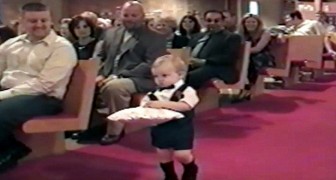 The little ring bearer is doing fine --- but see what he does at the end! 