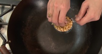 Here is the ultimate trick for making popcorn --- Use a wok! 