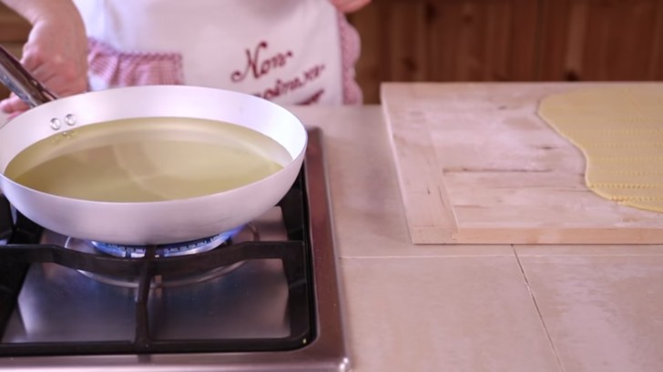 Heat a generous amount of sunflower oil in a pan for frying.