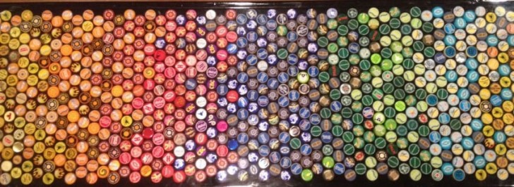 Five layers were needed to completely cover all the bottle caps.