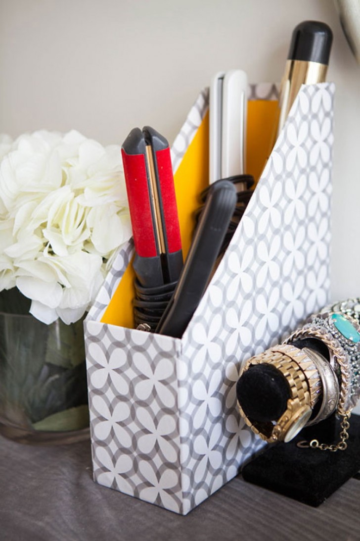 14. These folder holders are useful for many different situations. Like for instance, in the bathroom to store hair dryers and hair straighteners.