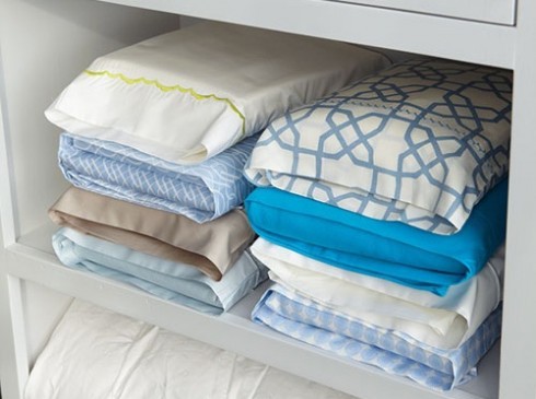 7. Organize your bed linens by complete sets! It is easy! First, take one pillowcase, and next put all the components of a set -- the other pillowcase, the pair of sheets and possibly the duvet cover in the pillowcase!