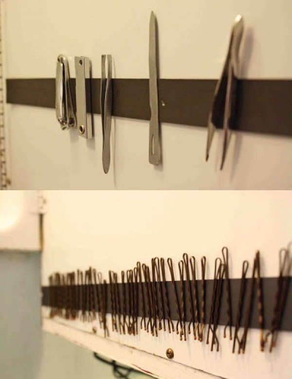 7. Apply a magnetic strip to the bathroom wall and your tweezers, scissors, and bobby pins will always be in order!