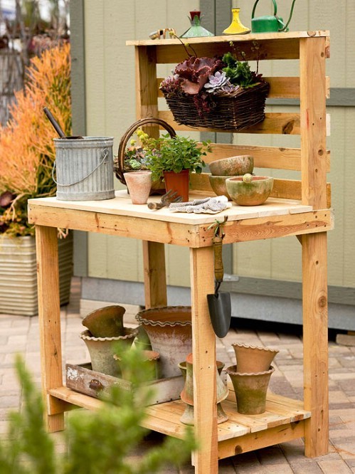 5. With leftover pieces of wood, you can create a lovely workbench --- very convenient for storing gardening tools and for taking care of smaller plants.
