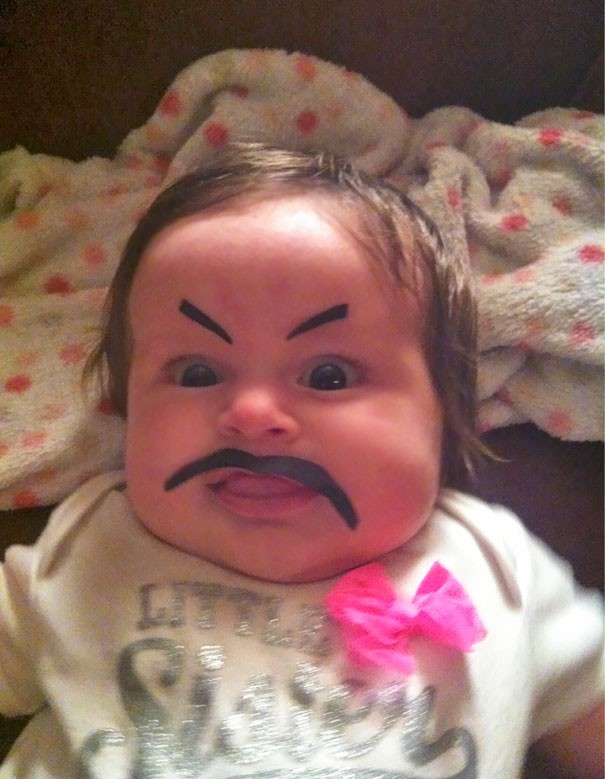 8. Just draw eyebrows and mustache on a kid's face and they immediately become hilarious!