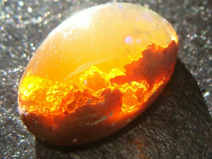 A sunset captured within an opal creates a surreal spectacle