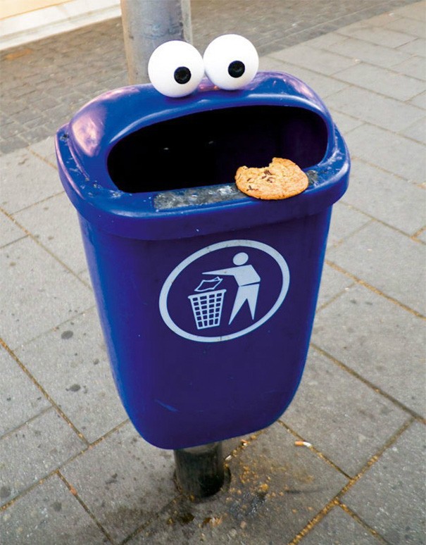 3. A trash can is eating a biscuit!