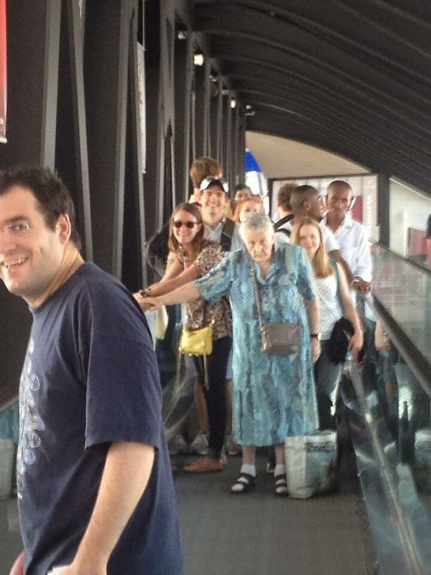 Granny has preceded them on the escalator and as for the other ... They wait.