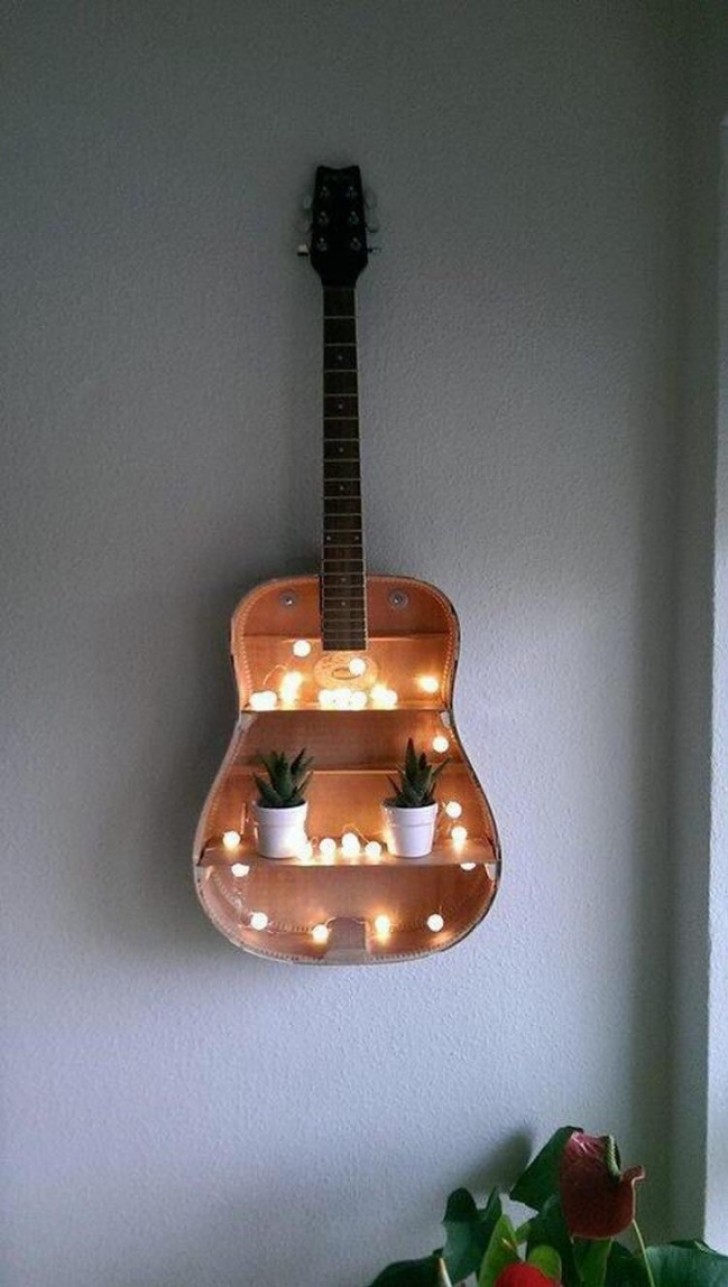 8. Shelves inside an old guitar.