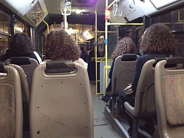 Dark and curly hair! In many cities, all the girls seem to wear their hair like this.