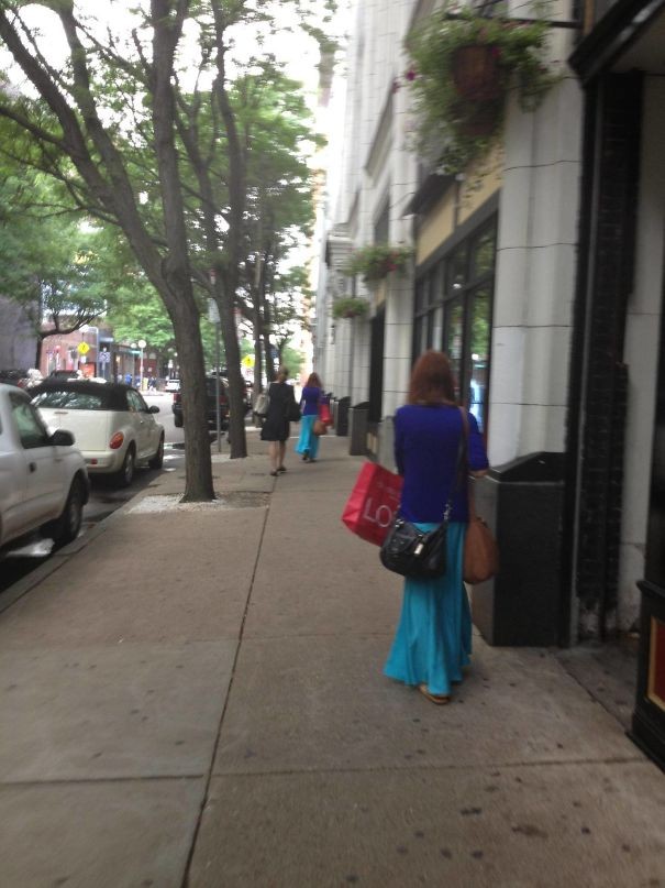 Same matching clothes, purse and shopping bags.