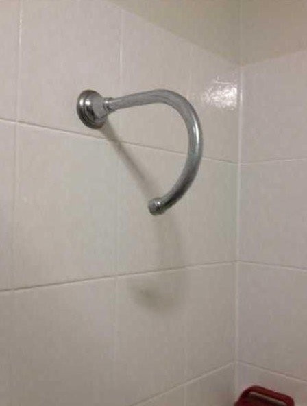 11. A wall-mounted shower.