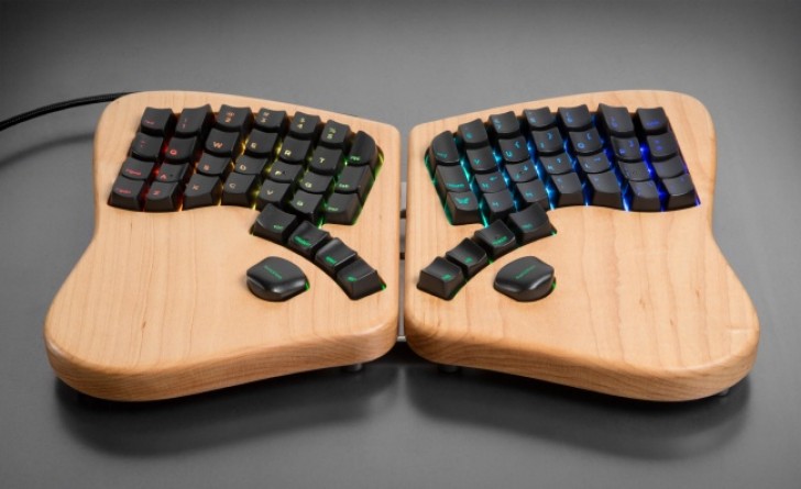 A butterfly-shaped PC keyboard. Its shape allows you to type letters and digits while keeping your hands in a natural position.