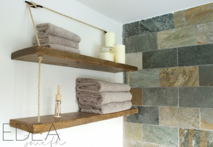 2. Solid wooden shelves on which to place extra towels and other bath items.