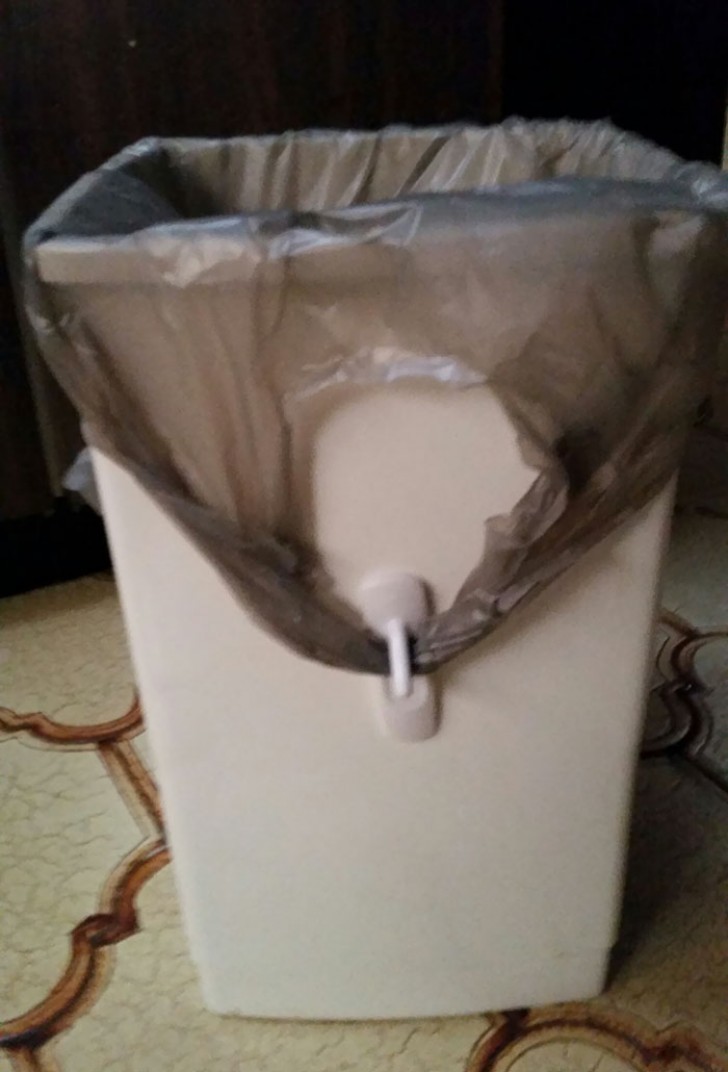 13. With hooks attached upside down, the garbage bag will always stay in place.