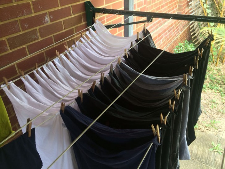 14. How to hang out the laundry using half the clothespins.