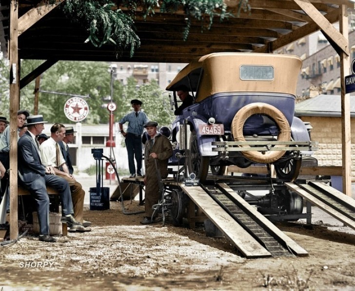 20. Auto mechanics at a car repair shop in Washington, DC in 1924.