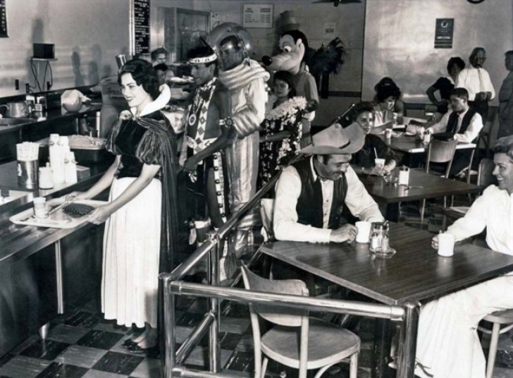 8. Lunch break at Disneyland with all the employees in costume in 1961.
