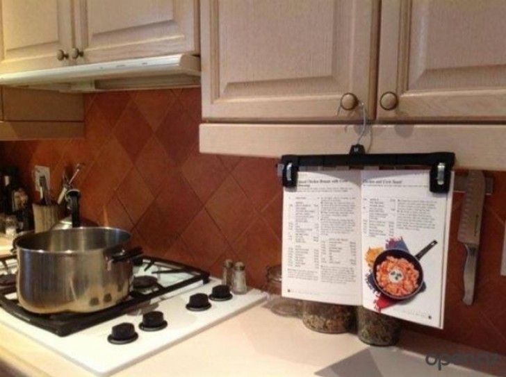 3. Support your recipe book using a clothes hanger.