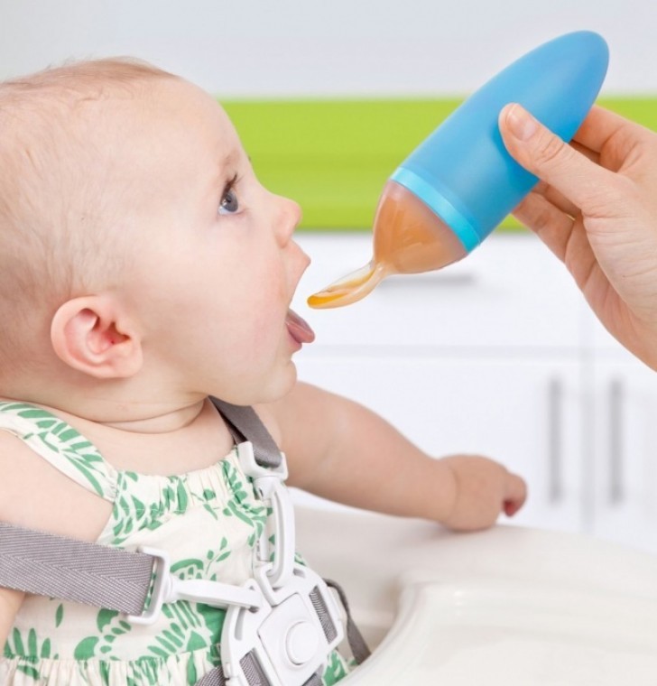 11. A bottle spoon --- just put the baby food in the bottle and squeeze to make it come out ... no more food spills!