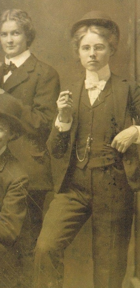 9. Late 19th century girls dressed in masculine clothing.